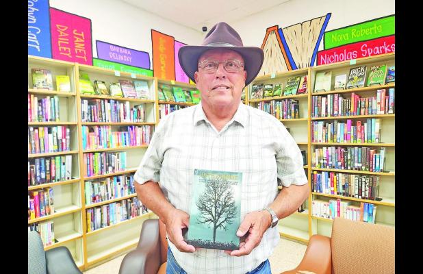 Local author hosts signing