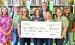 Hughes Springs Library staff receive check from SWEPCO for much needed A/C Unit Courtesy photo