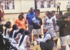 Daingerfield Head Girl’s Basketball Coach Marcus Latimore, kneeling, discusses with his team during a timeout in the Area playoff game against New Boston on Feb. 15. After winning the Bi-District Championship over White Oak earli BEE PHOTO / TONI WALKER