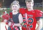 BEE PHOTO / TRISHA CAREY Elizabeth Boyd and Andrew Byrd were crowned homecoming royalty prior to the Hughes Spring Mustang’s final regular season game against New Boston Nov.1. The Mustangs won the contest, 35-7. Mustangs crown royalty prior to final game