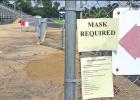 Fans entering Tiger Field at Mickey Mayne Stadium in Daingerfield are greeted with signs such as the ones shown. The signs show that masks are required to enter the stadium and give the COVID-19 screening protocol. BEE PHOTO / TONI WALKER D-LS ISD responds to anonymous complaint regarding masks, distancing