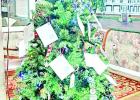 The Santa’s Secrets and Silver Angels Tree is now located in the Hughes Springs City Hall. RREsidents can pick an angel to help assist students and the elderly in having a happy holiday season. COURTESY PHOTO “Santa’s Secrets and Silver Angels” tree up at Hughes Springs City Hall