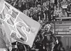 Members of the Hughes Springs football team enter Mustang Stadium for the final time during the 2021 season. The Mustangs rolled against Harleton, 50-28 to ensure a playoff berth. Hughes Springs crowns royalty, defeats Harleton 50-28