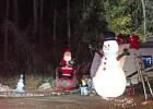 Daingerfield State Park hosted a drive through Christmas in the Park. Santa and Frost are standing outside one of the campsites. Each campsite featured various Christmas Lights and Decor Daingerfield State Park hosted a drive through Christmas in the Park. Santa and Frost are standing outside one of the campsites. Each campsite featured various Christmas Lights and Decor