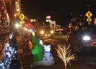 Cars crawled through Hughes Springs Dec. 17 as they took part in the “Reverse Christmas Parade” that was organized by community members and store owners after the Chamber Commerce cancelled the traditional Christmas Parade. BEE PHOTO / TONI WALKER “Reverse-Parade” a huge success in Hughes Springs