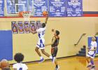 Daingerfield’s Dekevion Montgomery (12) goes up for a dunk against Gladewater at Jesse Hanson Gymnasium Jan. 22. Montgomery and the Tigers defeated Gladewater, 48-40. BEE PHOTO / TONI WALKER Tigers hands district front-runner Gladewater first loss