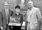 COURTESY PHOTO Cypress Bank donates laptop for Honors student