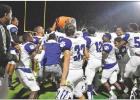 BEE PHOTOS / TONI WALKER The Daingerfield Tigers douse Coach Davin Nelson with ice water in celebration of the Tigers’ 62-0 win over the Corrigan-Camden Bulldogs in the 3A, Region 3, Division Regional playoffs on Nov. 30. See th Article Image Alt Text