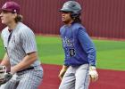 Daingerfield’s Reign Wallace (8) takes a lead-off at first base against Atlanta on Saturday.