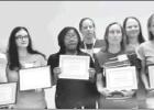 Participants in New Life Family Education’s most recent parenting and life skills classes display their certificates following presentations on Oct. 1. COURTESY PHOTO New Life Family Education presents certificates