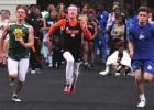 A Pewitt runner makes strides against Harleton and Queen City athletes in the J.K. Hileman Relays in Queen City on March 17. Pewitt took third in the meet behind Queen City and Union Grove. COURTESY PHOTO Brahma track third at Hileman Relays