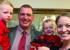 Joshua Willis, seen with his wife, Sarah, and their children, Beau (4), and Briar (2), was unanimously voted by the board to become the Mustangs’ new Athletic Director and Head Football Coach. COURTESY PHOTO Willis set to take helm at Hughes Springs