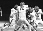 Mustangs stung by swarm of Hornets