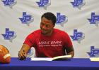 Pewitt’s Kadrien Johnson will play running back at Henderson State after signing a national letter of intent to play for the Reddies. National Signing Day