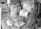 Brooke SanSebastian with her daughter Logyn SanSebastian with the two $15 gift cards they won for Two Señoritas Brooke SanSebastian with her daughter Logyn SanSebastian with the two $15 gift cards they won for Two Señoritas