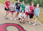 Making tracks: HS refreshes horseshoes on Mustang Blvd.
