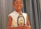 The newly-crowned Little Miss Juneteenth, Antonia Wooden, is all smiles The newly-crowned Little Miss Juneteenth, Antonia Wooden, is all smiles