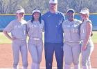 The Pewitt Lady Brahmas honored their four seniors prior to their home game against Hooks last week. Pictured from left are McKenzie Wharton, Jamesia Gilmore, Head Coach Travis Moore, Kelci Watson and Aubrey Neuman. COURTESY PHOTO Brahmas hold off Hooks, Lady Brahmas fall to Lady Hornets