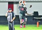 A pair of Mustang defenders, including Kord Johnson (19), disrupt a Mineola pass near the endzone. COURTESY PHOTOS / CAT VICKERY Hughes Springs stung by Mineola, fall to 0-2 on season