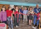 Gatsie Grace’s cut the ribbon at their new location. Gatsie Grace’s and Glory Be Hat Company open for business
