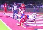 Daingerfield’s D’Co Wright gets upended as he scores during the second half of the Tigers’ 48-21 win over Harmony on Nov. 3. Tigers earn thirty-ninth district title in undefeated style