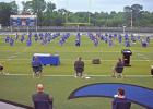 The Daingerfield High School Class of 2020 take their seats on the field for commencement ceremonies May 22. Article Image Alt Text