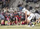 Mustangs beat New Diana, 32-8, for first win of 2022