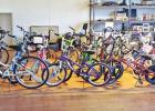 Mike McRae, of McRae’s Automotive, currently has 36 refurbished bicycles in his showroom, ready to pass out to community children in need. COURTESY PHOTO Simple request turns into one man’s ministry