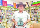 Local author hosts signing