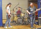 BEE PHOTO / TONI WALKER The band White Trash Wannabees performs during a benefit for Bobby and Acelynn Morris on Feb. 9. The benefit, hosted by The Community Theatre of East Texas and Jaime Cook, featured WTW in concert as well as a live auction that rais Article Image Alt Text