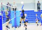Pewitt’s Taliyah Brown jumps for a spike during the Lady Brahmas’ season opener against Mount Vernon. By QUINTEN BOYD ‘Solid’ Lady Brahmas split