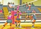 Hughes Springs Lady Mustang Hannah Abernathy (3) goes up for a hit against New Boston in recent action. Emma McKinney (10) looks on for Hughes Springs. Final scores for the matchup were unavailable at press time. BEE PHOTO / HEATHER RUSSELL Lady Mustangs take on New Boston