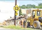 BEE PHOTO / TONI WALKER The old jail building on Jefferson Street in Daingerfield was reduced to a pile of rubble and debris after it was deemed unsafe for any other use. The lot will be used for a parking lot for the new municipal offices at the historic Article Image Alt Text