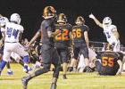 The Daingerfield Tiger defense reacts to a fumble against the DeKalb Bears Sept. 25. The Tigers came from behind to win the matchup, 36-29. BEE PHOTO / TONI WALKER Tigers score 22 unanswered points in comeback win