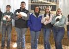 Daingerfield-Lone Star ISD superintendent Lesia Lewis (center) is seen with Daingerfield FFA members (from left) Blaze Anderson, Taylor Lowery, Salvador Velazquez, Rachael Walker, Madison Greenlee, and Emily Beasley at the Morris County Livestock Show on FFA, 4-H students show projects at Morris County Livestock Show