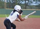 Daingerfield’s Jaelyn Wallace (4) squares around to bunt in the loss to Harmony last week. BEE PHOTOS / MICHAEL S. MCCRACKEN