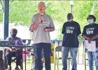 BEE PHOTO / TONI WALKER The community gathered June 20 in celebration of Juneteenth at the Daingerfield City Park. Church on the Rock Pastor Randy Seybert, in grey, speaks to those gathered while Maudie Peters and others look on. See more photos on page 8 “Unity brings positive change”