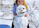 Daingerfield resident Gabby Reeder poses with her snowman made during last week’s snowfall. COURTESY PHOTO Area residents use snow to make unforgettable memories