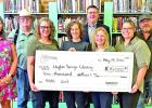 Hughes Springs Library staff receive check from SWEPCO for much needed A/C Unit Courtesy photo