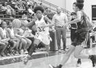 Daingerfield’s Mikayla Roberson brings the ball down during the Lady Tigers’ playoff win against Gladewater Feb. 17. The Lady Tigers advanced after the 77-60 win. BEE PHOTOS / TONI WALKER Article Image Alt Text