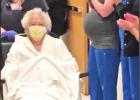 Sibyl Vickers is wheeled past applauding hospital staff after she recovered from COVID-19. The 99-year old Vickers was treated at UT Health-Pittsburg for the virus. COURTESY PHOTO Article Image Alt Text